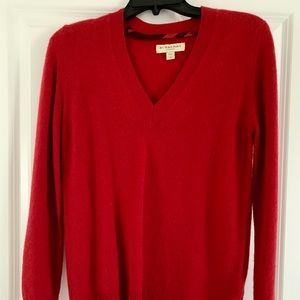 Red Burberry cashmere V neck sweater in size Medium.